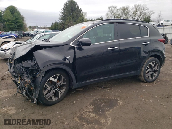2020 Kia Sportage EX z VIN KNDPNCAC1L7779818, wystawiony jako Copart lot #51934025 z przebiegiem 77 170 mil mil oraz Szkoda całkowita • Salvage title. Historia ofert i sprzedaży dostępna na DreamBid. Obrazek 1.