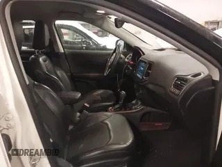 2018 Jeep Compass Trailhawk with VIN 3C4NJDDB2JT328269, listed as a IAAI auction lot 41597957 with 66,789 mi miles and . Bid and sale history available at carsss.com. Image 5.