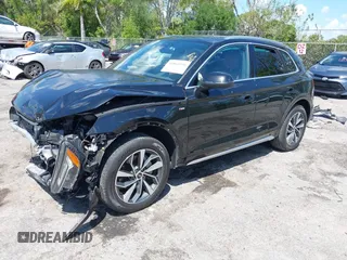 2023 Audi Q5 S line Premium Plus z VIN WA1EAAFY6P2168594, wystawiony jako IAAI lot #41863196 z przebiegiem 16 310 mil mil oraz . Historia ofert i sprzedaży dostępna na DreamBid. Obrazek 17.