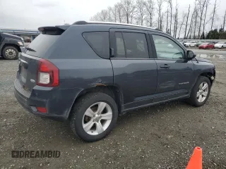 2014 Jeep Compass Latitude with VIN 1C4NJDEB4ED601769, listed as a Copart auction lot 48901365 with 129,826 mi miles and Salvage Title. Bid and sale history available at carsss.com. Image 3.