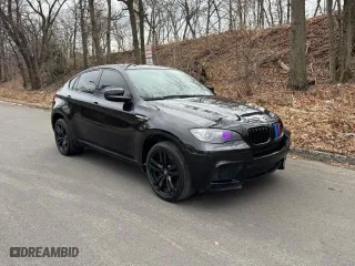 2011 BMW X6 M with VIN 5YMGZ0C5XBLK13932, listed as a Copart auction lot 44955755 with 113,057 mi miles and Clean Title. Bid and sale history available at carsss.com. Image 1.