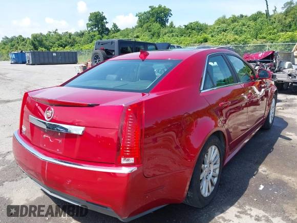 2013 Cadillac CTS Luxury with VIN 1G6DE5E55D0157455, listed as a IAAI auction lot 42469959 with 107,274 mi miles and . Bid and sale history available at DreamBid. Image 4.