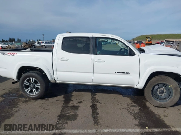 2017 Toyota Tacoma SR5 with VIN 5TFCZ5AN0HX077402, listed as a IAAI auction lot 41603762 with 118,257 mi miles and . Bid and sale history available at DreamBid. Image 13.