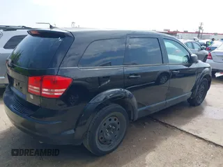 2014 Dodge Journey SE with VIN 3C4PDCABXET235827, listed as a IAAI auction lot 41927966 with 186,179 mi miles and . Bid and sale history available at carsss.com. Image 4.