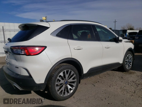 2020 Ford Escape Titanium Hybrid z VIN 1FMCU9DZXLUC07311, wystawiony jako Copart lot #48085815 z przebiegiem 50 472 mil mil oraz Szkoda całkowita • Salvage title. Historia ofert i sprzedaży dostępna na DreamBid. Obrazek 3.