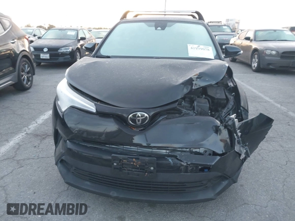 2019 Toyota C-HR XLE with VIN JTNKHMBXXK1034717, listed as a IAAI auction lot 41939078 with 56,309 mi miles. Bid and sale history available at carsss.com. Image 13.