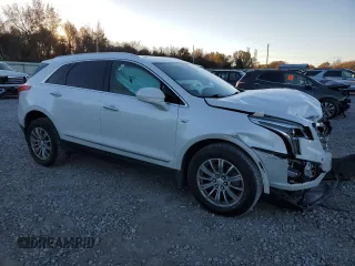 2017 Cadillac XT5 Luxury FWD with VIN 1GYKNBRS0HZ196145, listed as a Copart auction lot 83430344 with 143,012 mi miles and Salvage title. Bid and sale history available at DreamBid. Image 4.