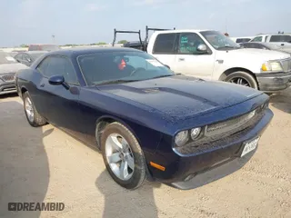 2014 Dodge Challenger SXT with VIN 2C3CDYAG8EH302199, listed as a IAAI auction lot 42075263 with 148,329 mi miles. Bid and sale history available at carsss.com. Image 1.