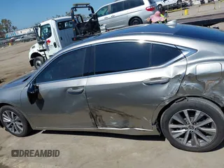 2021 Lexus ES 300h with VIN 58ACA1C1XMU007576, listed as a IAAI auction lot 42302934 with 24,614 mi miles and . Bid and sale history available at DreamBid. Image 14.