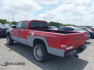 2002 Dodge Dakota Sport with VIN 1B7GL32X82S632091, listed as a IAAI auction lot 42091290 with 206,721 mi miles and . Bid and sale history available at carsss.com. Image 3.