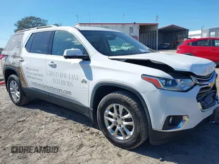 2019 Chevrolet Traverse LT Leather with VIN 1GNEVHKW2KJ306743, listed as a IAAI auction lot 41560538 with 132,641 mi miles. Bid and sale history available at carsss.com. Image 1.