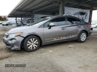 2012 Honda Civic LX z VIN 19XFB2F50CE324810, wystawiony jako Copart lot #58639975 z przebiegiem 157 033 mil mil oraz Tytuł czysty. Historia ofert i sprzedaży dostępna na DreamBid. Obrazek 1.