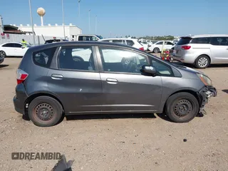 2013 Honda Fit with VIN JHMGE8H37DC048529, listed as a IAAI auction lot 42011202 with 255,113 mi miles. Bid and sale history available at carsss.com. Image 14.