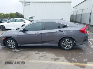 2017 Honda Civic EX z VIN 19XFC2F79HE036578, wystawiony jako IAAI lot #42380559 z przebiegiem 73 943 mil mil oraz . Historia ofert i sprzedaży dostępna na DreamBid. Obrazek 14.