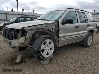 2004 Jeep Grand Cherokee Laredo with VIN 1J4GX48S14C231995, listed as a Copart auction lot 47069175 with 230,062 mi miles and Salvage Title. Bid and sale history available at carsss.com. Image 1.