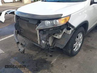 2012 Kia Sorento LX with VIN 5XYKT3A61CG235882, listed as a IAAI auction lot 41720081 with 136,282 mi miles. Bid and sale history available at carsss.com. Image 13.