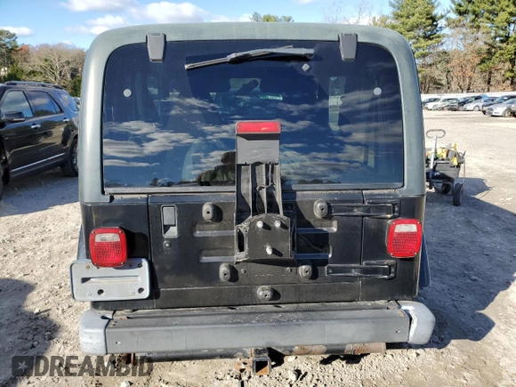 2002 Jeep Wrangler Sahara with VIN 1J4FA59S42P726814, listed as a Copart auction lot 80045514 with 197,196 mi miles and Clean Title. Bid and sale history available at carsss.com. Image 6.