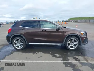 2015 Mercedes-Benz GLA 250 z VIN WDCTG4GB4FJ107864, wystawiony jako IAAI lot #41709927 z przebiegiem 102 070 mil mil oraz . Historia ofert i sprzedaży dostępna na DreamBid. Obrazek 14.