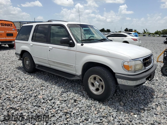 1998 Ford Explorer with VIN 1FMZU32X7WZB87549, listed as a Copart auction lot 60970165 with 186,022 mi miles and Salvage title. Bid and sale history available at DreamBid. Image 4.