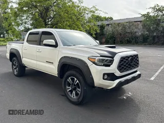 2021 Toyota Tacoma SR z VIN 3TMCZ5AN2MM426723, wystawiony jako Copart lot #58271925 z przebiegiem 46 562 mil mil oraz Szkoda całkowita • Salvage title. Historia ofert i sprzedaży dostępna na DreamBid. Obrazek 1.