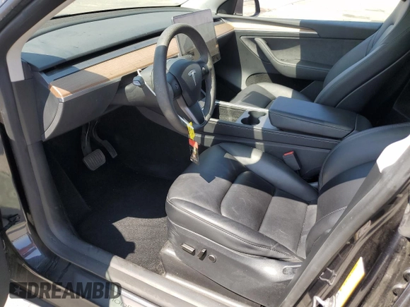 2024 Tesla Model Y Long Range z VIN 7SAYGDEE0RF062395, wystawiony jako Copart lot #55071185 z przebiegiem 42 747 mil mil oraz Szkoda całkowita • Salvage title. Historia ofert i sprzedaży dostępna na DreamBid. Obrazek 7.