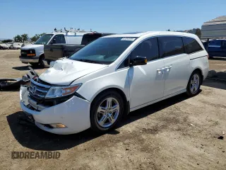 2013 Honda Odyssey Touring with VIN 5FNRL5H90DB091163, listed as a Copart auction lot 61593095 with 160,344 mi miles and Salvage title. Bid and sale history available at DreamBid. Image 1.