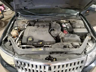 2009 Lincoln MKZ z VIN 3LNHM28T09R606344, wystawiony jako Copart lot #56650495 z przebiegiem 151 144 mil mil oraz Szkoda całkowita • Salvage title. Historia ofert i sprzedaży dostępna na DreamBid. Obrazek 11.