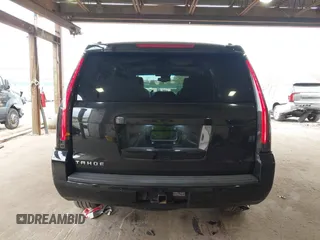 2015 Chevrolet Tahoe LT with VIN 1GNSKBKCXFR604401, listed as a IAAI auction lot 42048559 with 60,768 mi miles and . Bid and sale history available at DreamBid. Image 16.