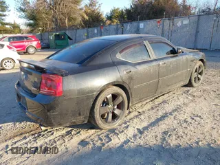 2006 Dodge Charger SRT-8 with VIN 2B3KA73W36H333944, listed as a IAAI auction lot 41339051 with 155,475 mi miles and . Bid and sale history available at carsss.com. Image 4.