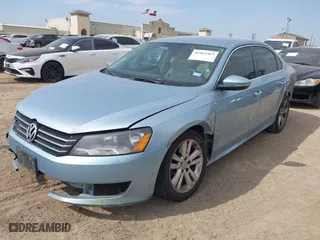2012 Volkswagen Passat SE w/Sunroof with VIN 1VWBP7A34CC053418, listed as a IAAI auction lot 41961463 with 173,543 mi miles. Bid and sale history available at carsss.com. Image 2.