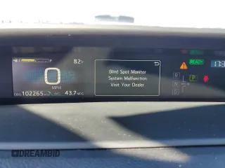 2022 Toyota Prius L Eco with VIN JTDKAMFU6N3174068, listed as a Copart auction lot 50403295 with 102,265 mi miles and Salvage Title. Bid and sale history available at DreamBid. Image 9.