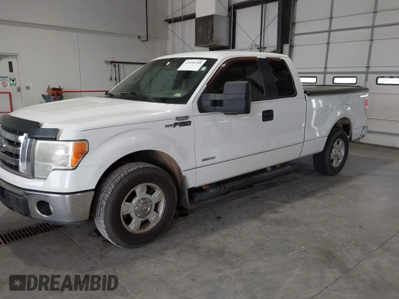 2011 Ford F-150 XL with VIN 1FTFX1CT9BFB10353, listed as a IAAI auction lot 42090388 with 469,657 mi miles. Bid and sale history available at carsss.com. Image 2.