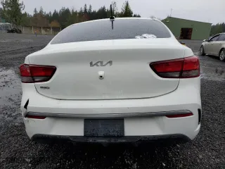 2022 Kia Rio S with VIN 3KPA24AD7NE448158, listed as a Copart auction lot 52122265 with 0 mi miles and Salvage Title. Bid and sale history available at carsss.com. Image 6.
