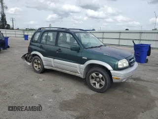 1999 Suzuki Grand Vitara JLX z VIN JS3TD62V0X4124366, wystawiony jako Copart lot #50885055 z przebiegiem 204 168 mil mil oraz Szkoda całkowita • Salvage title. Historia ofert i sprzedaży dostępna na DreamBid. Obrazek 4.