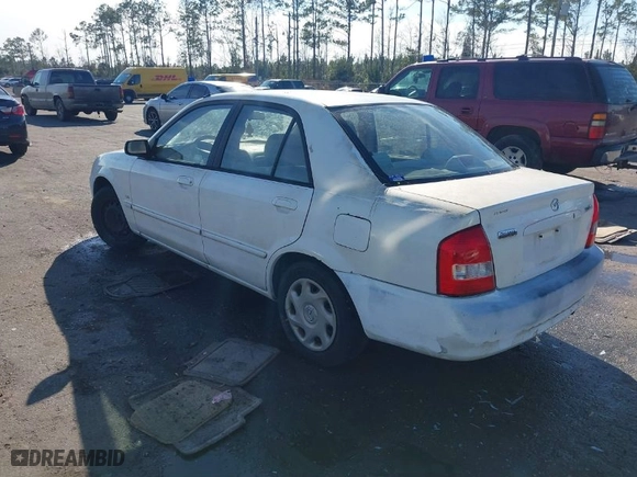2001 Mazda Protege DX with VIN JM1BJ222010432993, listed as a IAAI auction lot 41454510 with 137,220 mi miles. Bid and sale history available at carsss.com. Image 3.