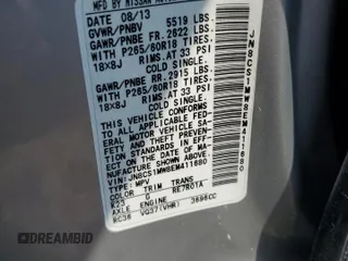 2014 Infiniti QX70 with VIN JN8CS1MW8EM411680, listed as a Copart auction lot 60350065 with 124,245 mi miles and Salvage title. Bid and sale history available at DreamBid. Image 13.