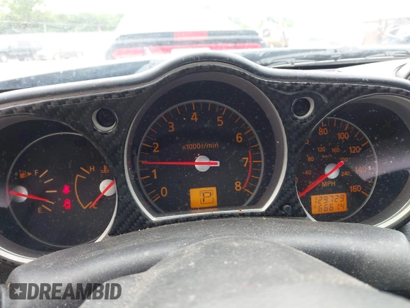 2006 Nissan 350Z Touring z VIN JN1AZ36A76M456514, wystawiony jako IAAI lot #42266616 z przebiegiem 129 729 mil mil oraz . Historia ofert i sprzedaży dostępna na DreamBid. Obrazek 7.
