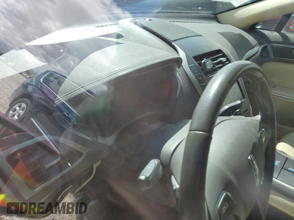 2013 Lincoln MKZ z VIN 3LN6L2G95DR804619, wystawiony jako Copart lot #57101315 z przebiegiem Nie podano mil oraz Szkoda całkowita • Salvage title. Historia ofert i sprzedaży dostępna na DreamBid. Obrazek 9.