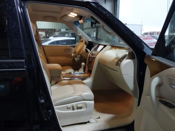 2014 Infiniti QX80 z VIN JN8AZ2NF9E9555118, wystawiony jako IAAI lot #41168367 z przebiegiem 177 662 mil mil oraz . Historia ofert i sprzedaży dostępna na DreamBid. Obrazek 5.