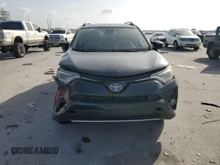 2016 Toyota RAV4 Limited z VIN JTMDJREV1GD013351, wystawiony jako Copart lot #60057045 z przebiegiem 127 355 mil mil oraz Szkoda całkowita • Salvage title. Historia ofert i sprzedaży dostępna na DreamBid. Obrazek 5.