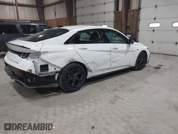 2025 Hyundai Elantra N Line z VIN KMHLR4DF6SU867998, wystawiony jako IAAI lot #41814806 z przebiegiem 4 892 mil mil oraz . Historia ofert i sprzedaży dostępna na DreamBid. Obrazek 4.