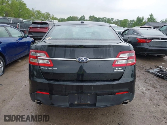 2015 Ford Taurus SEL z VIN 1FAHP2E86FG172631, wystawiony jako IAAI lot #42307630 z przebiegiem 95 184 mil mil oraz . Historia ofert i sprzedaży dostępna na DreamBid. Obrazek 17.