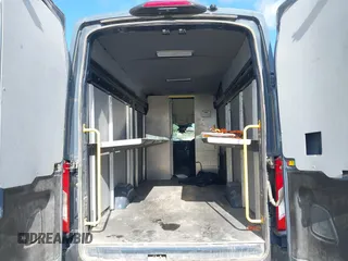 2021 Ford Transit Cargo with VIN 1FTBR3X89MKA54791, listed as a IAAI auction lot 42515449 with 57,847 mi miles and . Bid and sale history available at DreamBid. Image 8.