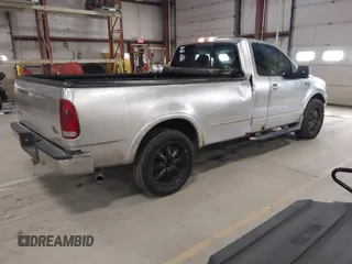 2005 Ford F-150 XL with VIN 1FTRF12W15NA18935, listed as a IAAI auction lot 41942570 with 152,708 mi miles and . Bid and sale history available at DreamBid. Image 4.