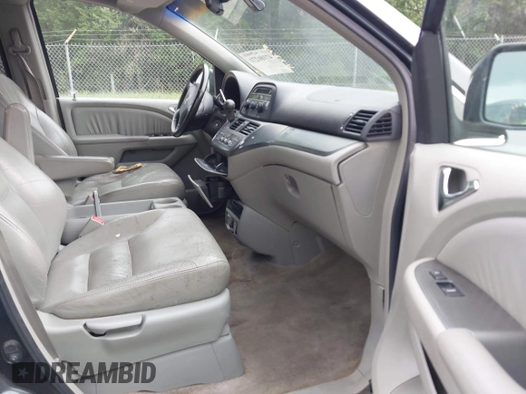 2006 Honda Odyssey EX-L z VIN 5FNRL38756B420817, wystawiony jako IAAI lot #42101271 z przebiegiem 203 892 mil mil oraz . Historia ofert i sprzedaży dostępna na DreamBid. Obrazek 5.