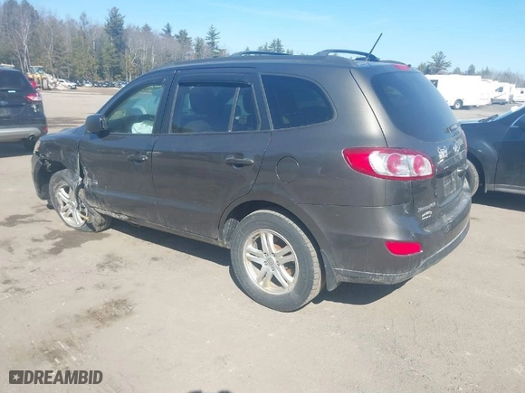 2012 Hyundai Santa Fe GLS with VIN 5XYZGDAB5CG126900, listed as a IAAI auction lot 41781584 with 124,897 mi miles. Bid and sale history available at carsss.com. Image 3.