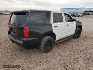 2017 Chevrolet Tahoe Commercial with VIN 1GNLCDEC4HR219881, listed as a Copart auction lot 50574145 with 115,700 mi miles and Salvage Title. Bid and sale history available at carsss.com. Image 3.