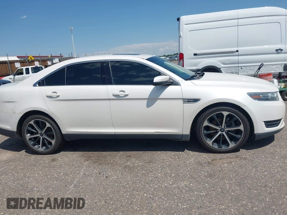 2015 Ford Taurus SEL with VIN 1FAHP2H8XFG203309, listed as a IAAI auction lot 42598215 with 163,190 mi miles and . Bid and sale history available at DreamBid. Image 13.