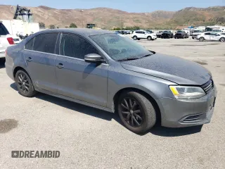 2013 Volkswagen Jetta SE with VIN 3VWDP7AJ5DM355176, listed as a Copart auction lot 60324525 with 192,226 mi miles and Salvage title. Bid and sale history available at DreamBid. Image 4.