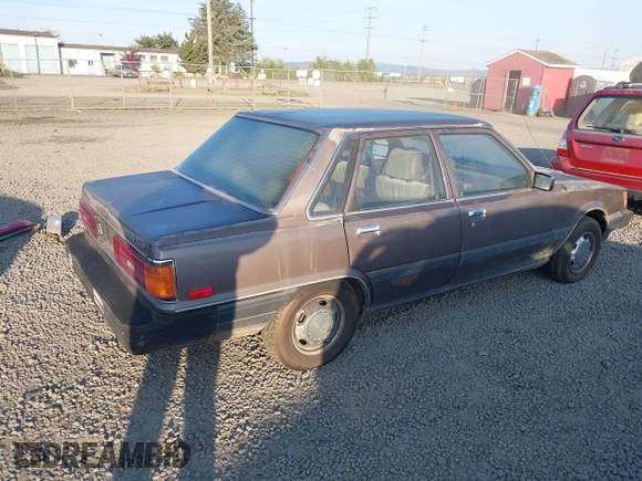 1985 Toyota Camry z VIN JT2SV12EXF0291360, wystawiony jako IAAI lot #42094530 z przebiegiem 426 444 mil mil oraz . Historia ofert i sprzedaży dostępna na DreamBid. Obrazek 4.